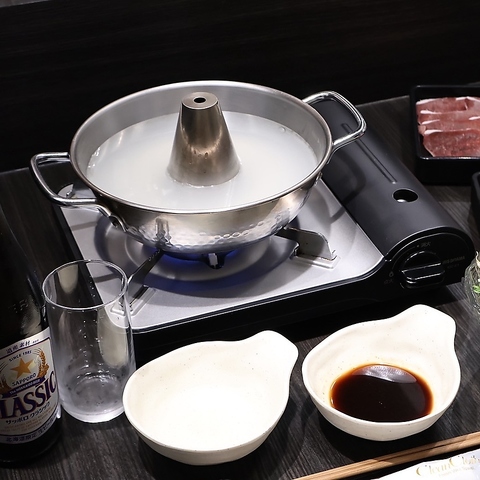 ぐつぐつと煮えるお鍋とお飲み物